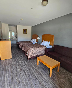 King Room with Two King Beds at Whitesboro Inn & Suites